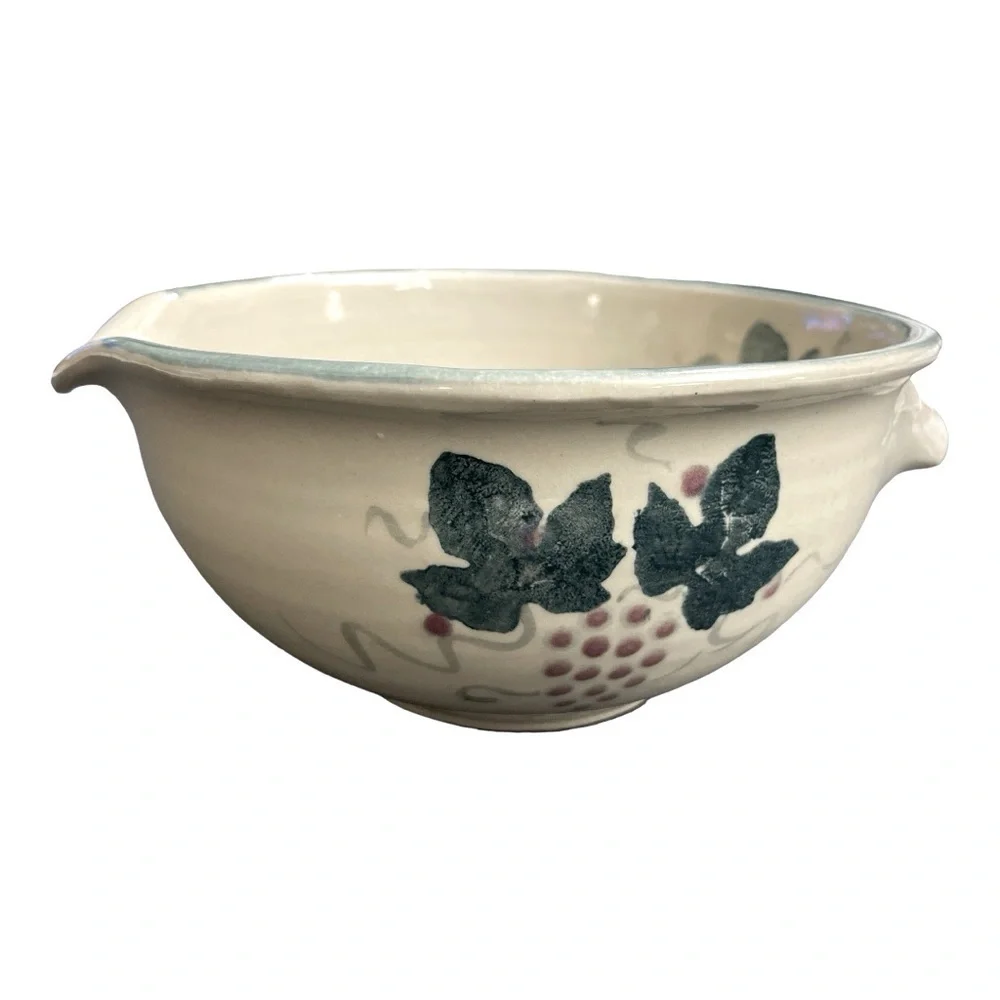 Handmade Bowl w/ Grape vines/ leaves. Singed by artist. Handle/ lip for pouring